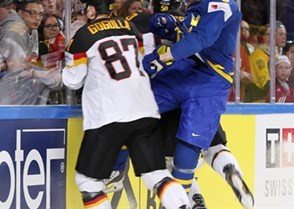 COLOGNE, GERMANY - MAY 6: Sweden's John Klingberg #3 collides with Germany's Philip Gogulla #87 and Patrick Hager #50 during preliminary round action at the 2017 IIHF Ice Hockey World Championship. (Photo by Andre Ringuette/HHOF-IIHF Images)

