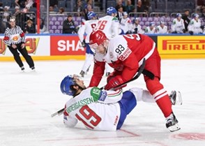 COLOGNE, GERMANY - MAY 15: Denmark\s Peter Regin #93 takes down Italy's Raphael Andergassen #19 during preliminary round action at the 2017 IIHF Ice Hockey World Championship. (Photo by Andre Ringuette/HHOF-IIHF Images)

